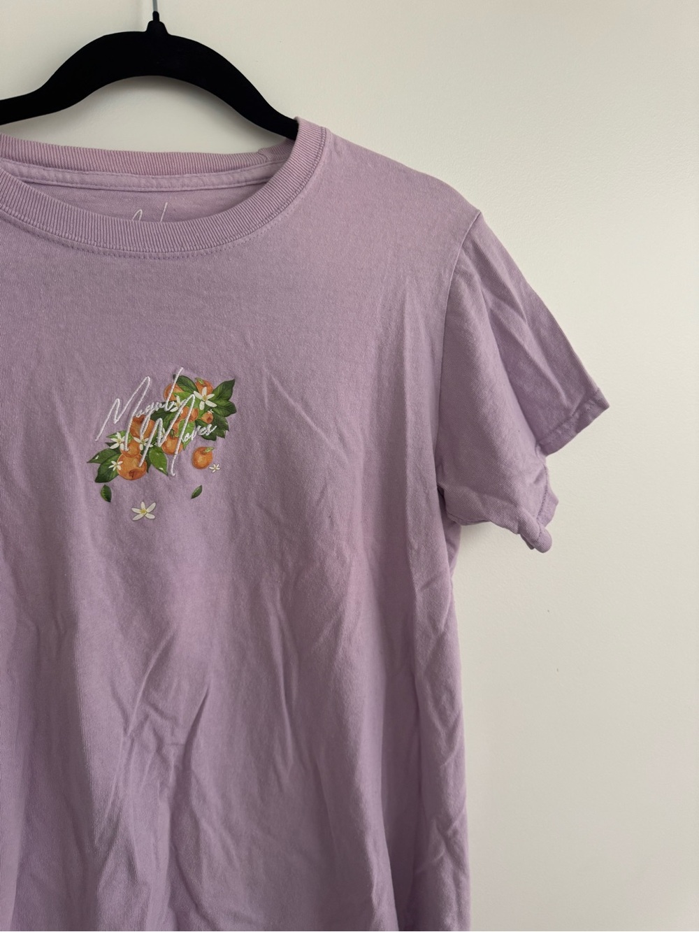 Mogul Moves Purple Lavender Graphic Tee with Orange Floral Motif